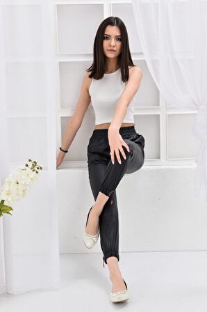 Modkofoni Bel ve Paça Lastikli Bağcık Detaylı Siyah Kadın Deri Pantolon