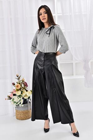 Modkofoni Bol Paça ve Yırtmaçlı Siyah Kadın Deri Pantolon