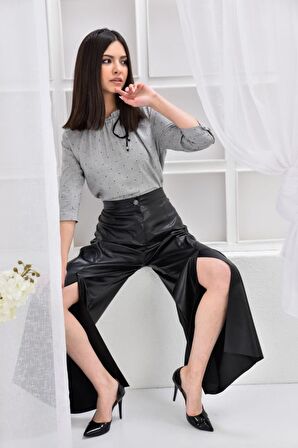 Modkofoni Bol Paça ve Yırtmaçlı Siyah Kadın Deri Pantolon