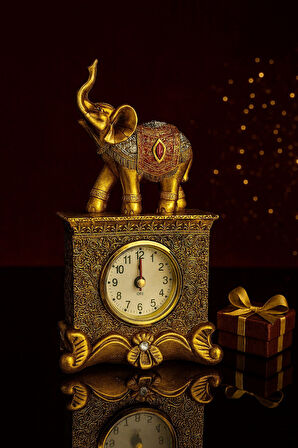 Fil Figürlü Zarif Masa Saati Bolluk Şans Simgesi Kırmızı Taş Detay Altın Renkli Fil Masa Saati 19 Cm