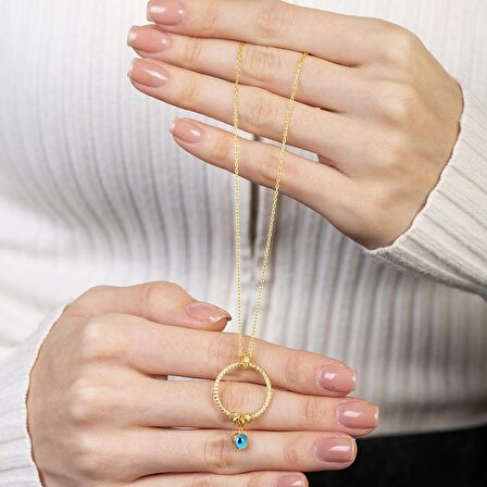 Beyaz Zirkon Taşlı Nazar Boncuğu Detaylı Dorika Top Süslemeli Gold Renk 925 Ayar Gümüş Kadın Kolye