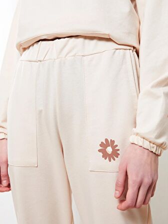 Beli Lastikli Baskılı Cep Detaylı Kadın Jogger Eşofman Altı
