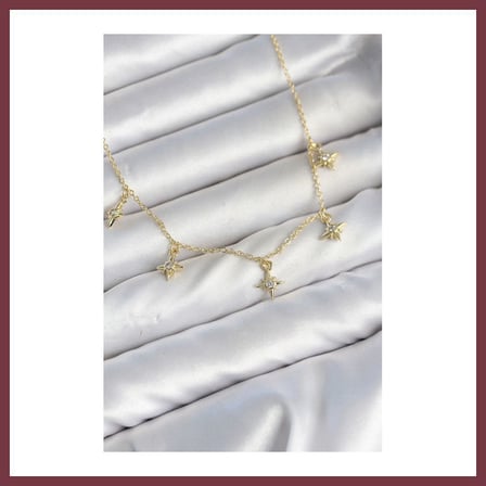SHNSTORE Pirinç Gold Renk Sıralı Minimal Kutup Yıldızı Model Kadın Kolye SHN0720