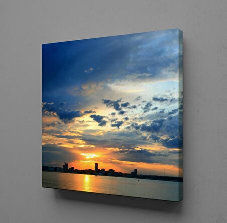 BULUTLU GÖKYÜZÜ ARASINDAN ÇIKAN GÜNEŞ