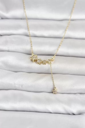 Pirinç Gold Renk Minimal Sallantılı Yıldız Model Kadın Kolye TJ-BKO11122