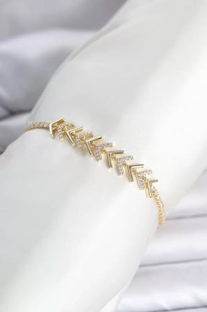 Pirinç Gold Renk Zirkon Taşlı Çavuş Model Su Yolu Kadın Bileklik