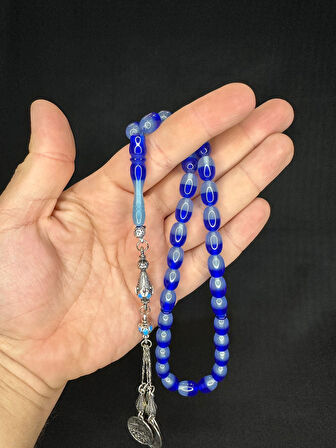 TOZ KEHRİBAR TESBİH MAVİ/LACİVERT RENKLİ KAPSÜL KESİM 12MMX8MM T-604