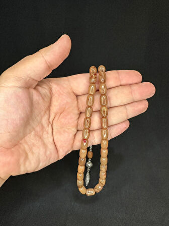 SIKMA KEHRİBAR TESBİH KOYU KREM RENKLİ KAPSÜL KESİM 11,5MMX7,5MM T-608