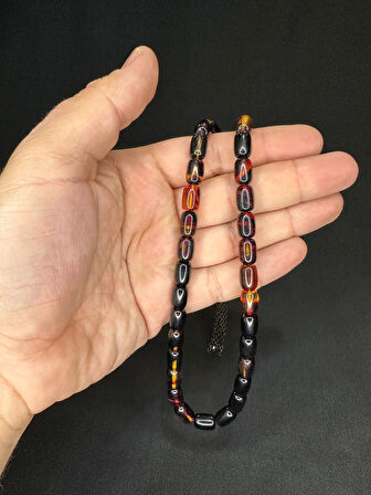 SIKMA KEHRİBAR TESBİH SİYAH-SARI RENKLİ KAPSÜL KESİM 11MMX8MM T-616