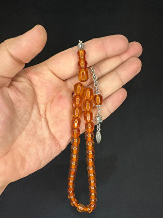 TOZ KEHRİBAR TESBİH BAL RENKLİ KAPSÜL KESİM 11MMX9MM T-625