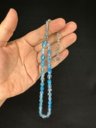 TOZ KEHRİBAR TESBİH MAVİ RENKLİ BEYZİ KESİM 10MMX6,5MM T-680