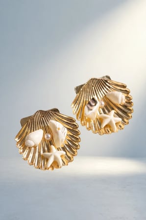 Şık Gold Renk Deniz Kabuğu Ve Yıldız Detaylı Küpe