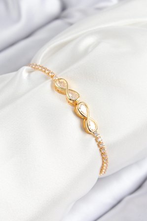 Pirinç Zirkon Taşlı Sonsuzluk Model Gold Renk Asansörlü Kadın Bileklik TJ-BB7721