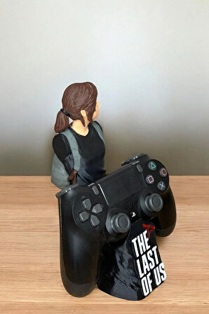 Ellie Figürlü PS4/PS5 Kol Tutucu – The Last of Us Temalı Oyun Aksesuarı | 3D Baskı Stand