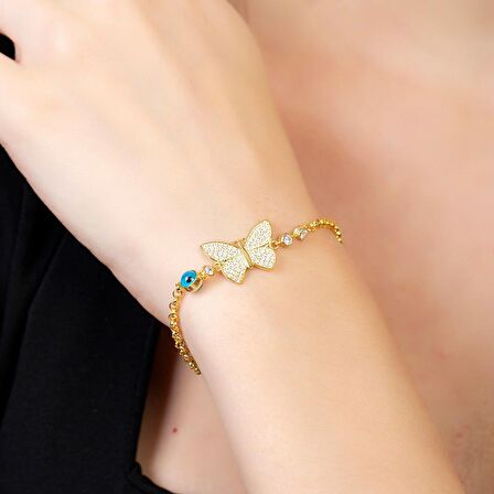 Beyaz Zirkon Taşlı Gold Renk Kelebek Tasarım Nazar Boncuğu Detaylı 925 Ayar Gümüş Kadın Bileklik