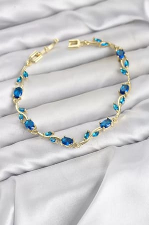 Pirinç Gold Renk Mavi Zirkon Taşlı Çiçek Model Kadın Bileklik TJ-BB8575