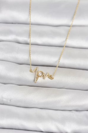 Pirinç Gold Renk Kalp Ritmi Model Kadın Kolye TJ-BKO11124