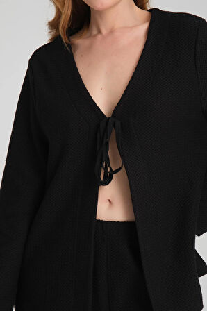 Kadın V Yaka Hırka ve Geniş Paça Pantolon Takımı - Konforlu ve Trend Günlük Kombin