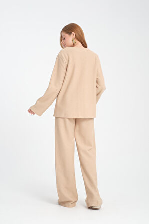 Kadın V Yaka Hırka ve Geniş Paça Pantolon Takımı - Konforlu ve Trend Günlük Kombin