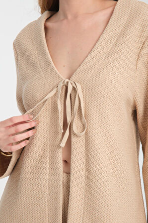 Kadın V Yaka Hırka ve Geniş Paça Pantolon Takımı - Konforlu ve Trend Günlük Kombin