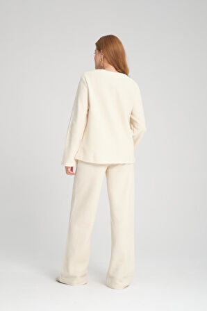 Kadın V Yaka Hırka ve Geniş Paça Pantolon Takımı - Konforlu ve Trend Günlük Kombin