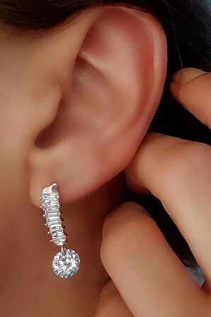 Baget kesim zirkon taşlı gümüş üzerine rose altın kaplamalı küpe