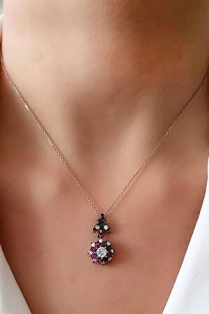 Elmas isciliginde zirkon kok yakut taşlı gümüş kolye