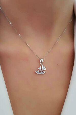 Zirkon taş detaylı gümüş sörfçü yelkenli tasarım kolye