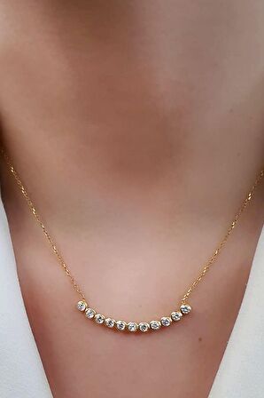 Zirkon taşlı gümüş üzerine altın kaplama yay kolye 