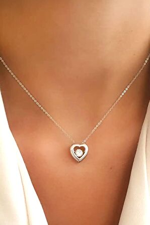 Pırlanta ışıltısında zirkon taşlı 925ayar gümüş kalp figürlü tek taşı hareketli kolye