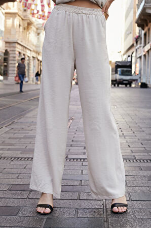 Kadın Likrasız Keten Kumaş Yüksek Bel Beli Lastikli Yan Cepli Bol Paça Palazzo Pantolon-Bej 