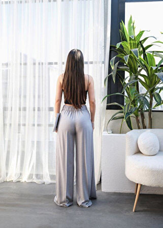 Keten Önü Çapraz Parçali Lasti̇kli̇ Ve Bağcikli Geni̇ş Paça Pantolon