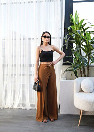 Keten Önü Çapraz Parçali Lasti̇kli̇ Ve Bağcikli Geni̇ş Paça Pantolon