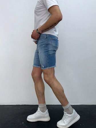 Açık Mavi Yıkamalı Paça Püskül Detay Slim Fit Jean Şort