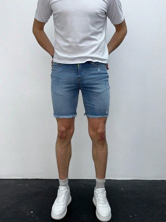 Açık Mavi Yıkamalı Paça Püskül Detay Slim Fit Jean Şort