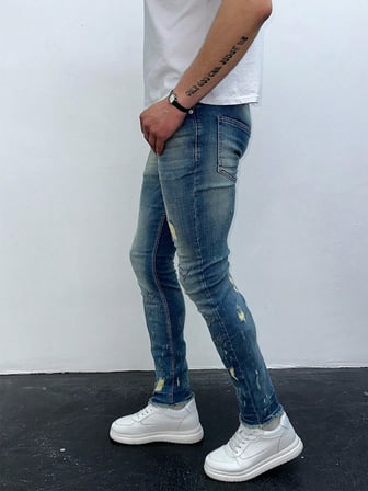 Erkek Açık Mavi Yıpratma Detay Slim Fit Likralı Skinny Jean Pantolon