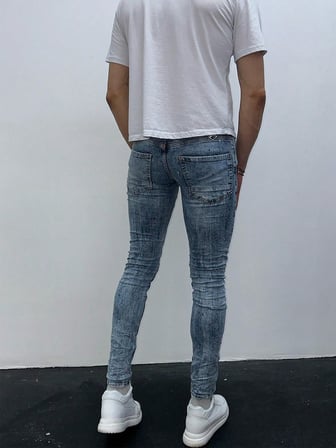 Erkek Açık Mavi Boya Sıçratmalı Yırtık Detay Slim Fit Skinny Jean Pantolon