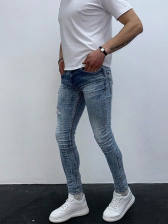 Erkek Açık Mavi Boya Sıçratmalı Yırtık Detay Slim Fit Skinny Jean Pantolon