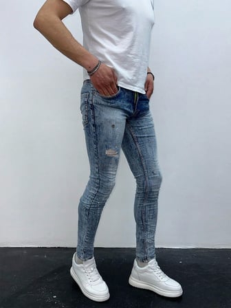 Erkek Açık Mavi Boya Sıçratmalı Yırtık Detay Slim Fit Skinny Jean Pantolon