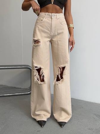 Kadın Yüksek Bel Ön Ve Arka Yırtık Detaylı Geniş Paça Kot Pantolon