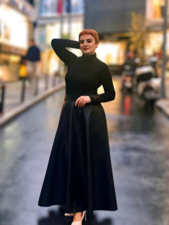 Deri cepli  kloş uzun etek 