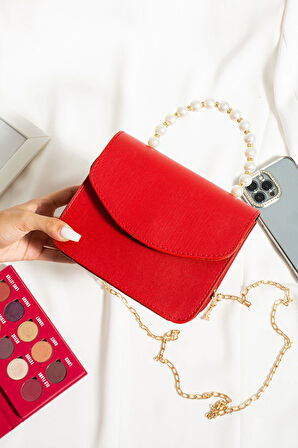 El ve omuz çantası inci boncuklu