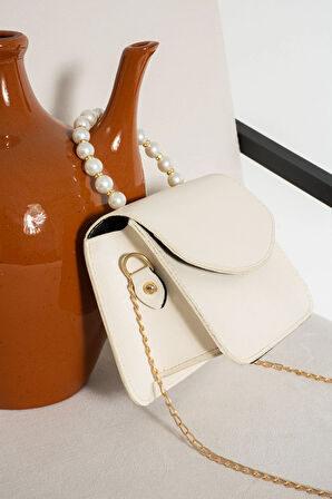 El ve omuz çantası inci boncuklu