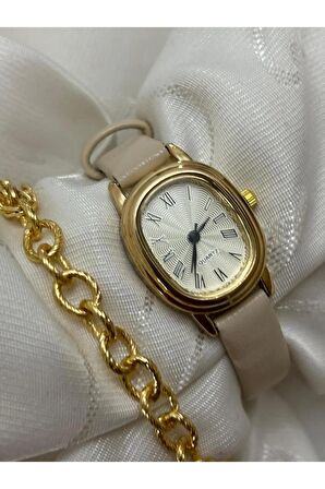 Retro Minimal Deri Kordon Vintage Oval Gold Kasa Kadın Kol Saati Bej Rengidir