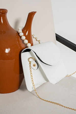 El ve omuz çantası inci boncuklu