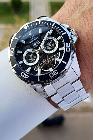 Daniel Klein DKISTE1261 Kadranı Siyah Kordonu Gümüş Renk Otomatik Takvimli Hediye Paketli Erkek Kol Saati