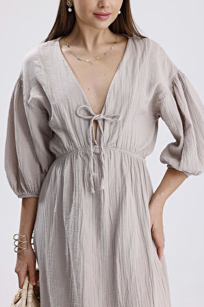 Kadın Bej Konfor Modeli V Yaka Balon Kol Müslin Elbise Bağlamalı Bel Büzgülü A Kesim Uzun Elbise