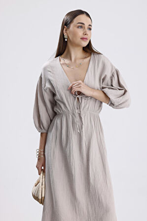 Kadın Bej Konfor Modeli V Yaka Balon Kol Müslin Elbise Bağlamalı Bel Büzgülü A Kesim Uzun Elbise