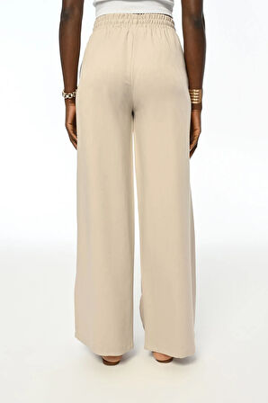 BELİ LASATİKLİ RAHAT KALIP BOL PAÇA PANTOLON