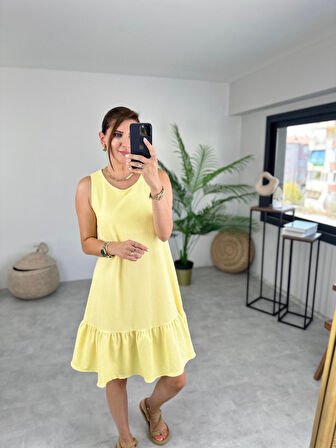 Yonca Moda Evi Kadın Bürümcük Kumaş Eteği Fırfır Detaylı Sıfır Kol Elbise